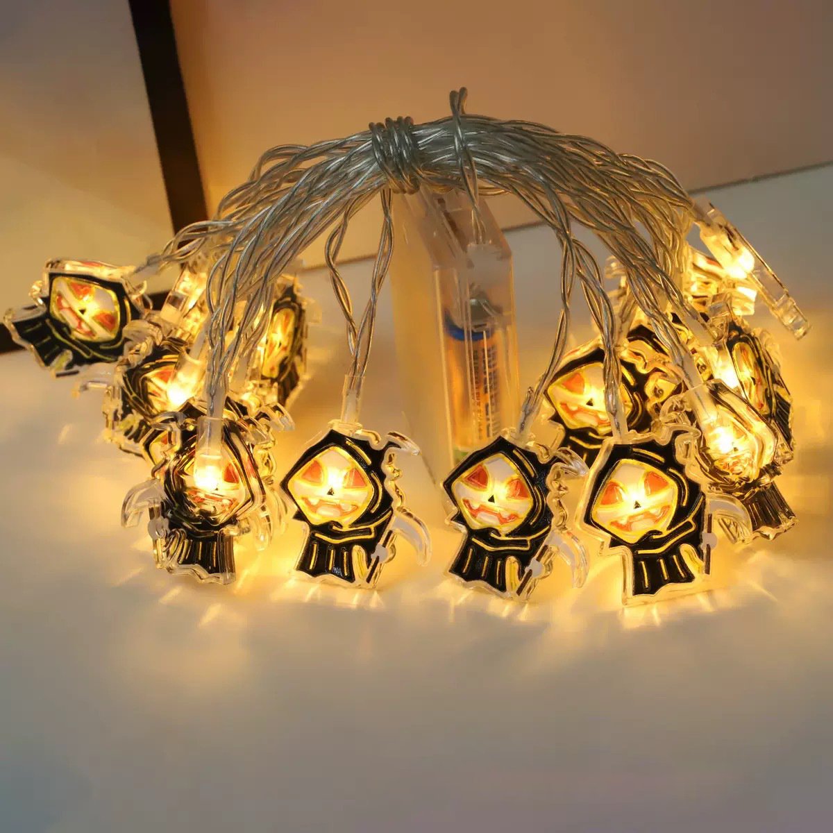 š2025 Halloween Hot Saleā”Halloween LED Light String - 10ft Battery-Powered Fairy Lights with Ghosts, Pumpkins, Spiders & Skulls for Indoor/Outdoor Decor